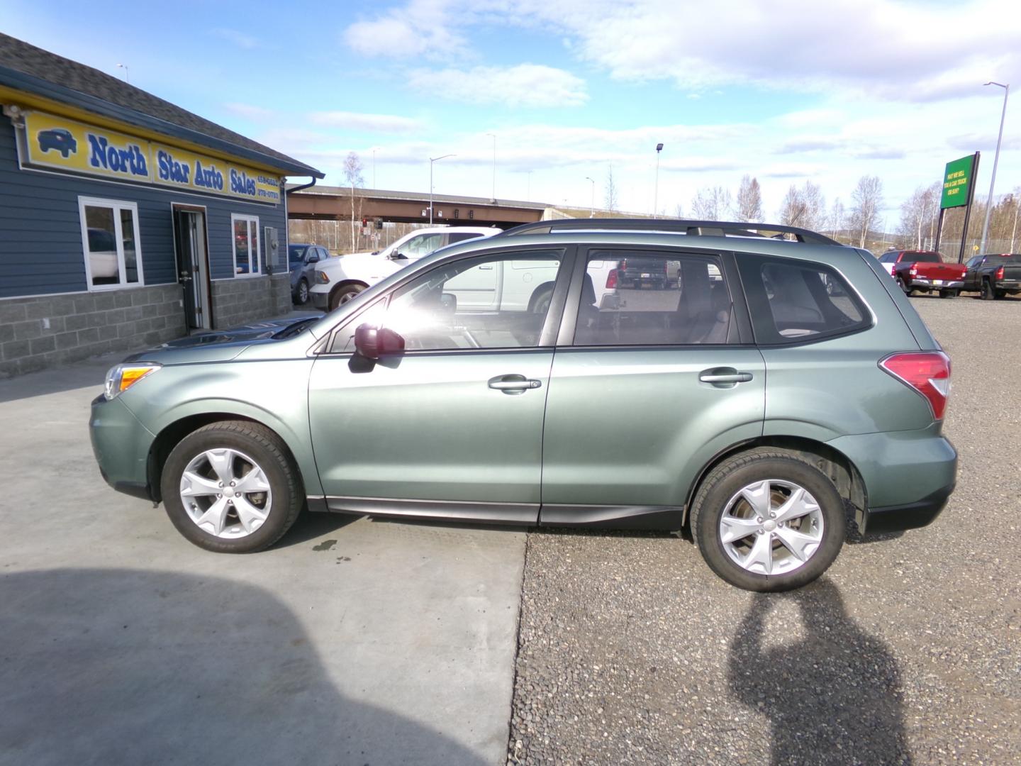 2015 Green Subaru Forester 2.5i Premium (JF2SJABC5FH) with an 2.5L H4 SOHC 16V engine, 6-Speed Automatic transmission, located at 2630 Philips Field Rd., Fairbanks, AK, 99709, (907) 458-0593, 64.848068, -147.780609 - Photo#2